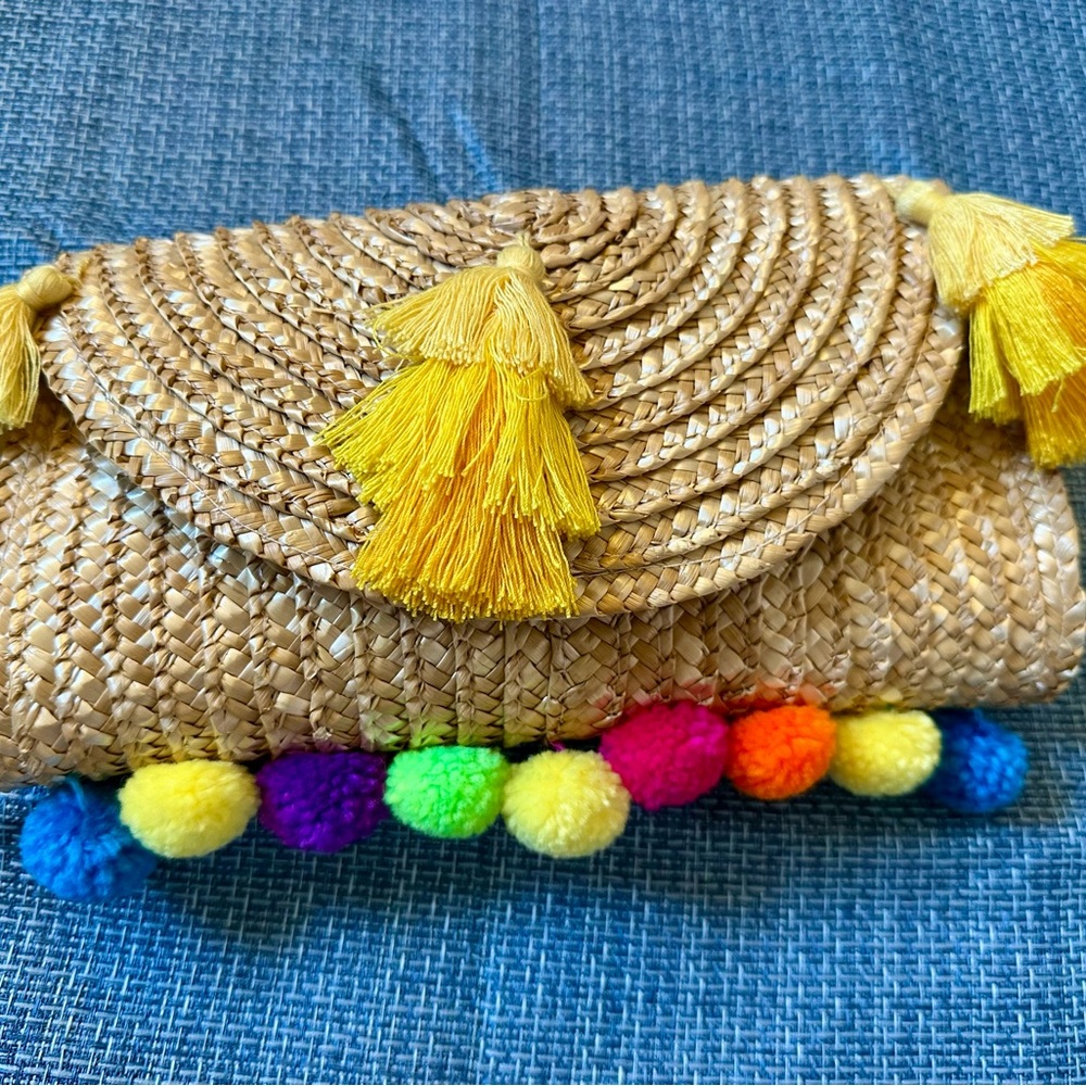 Woven Clutch with Colorful Pom Poms Perfect for the Beach or Summer Outfits